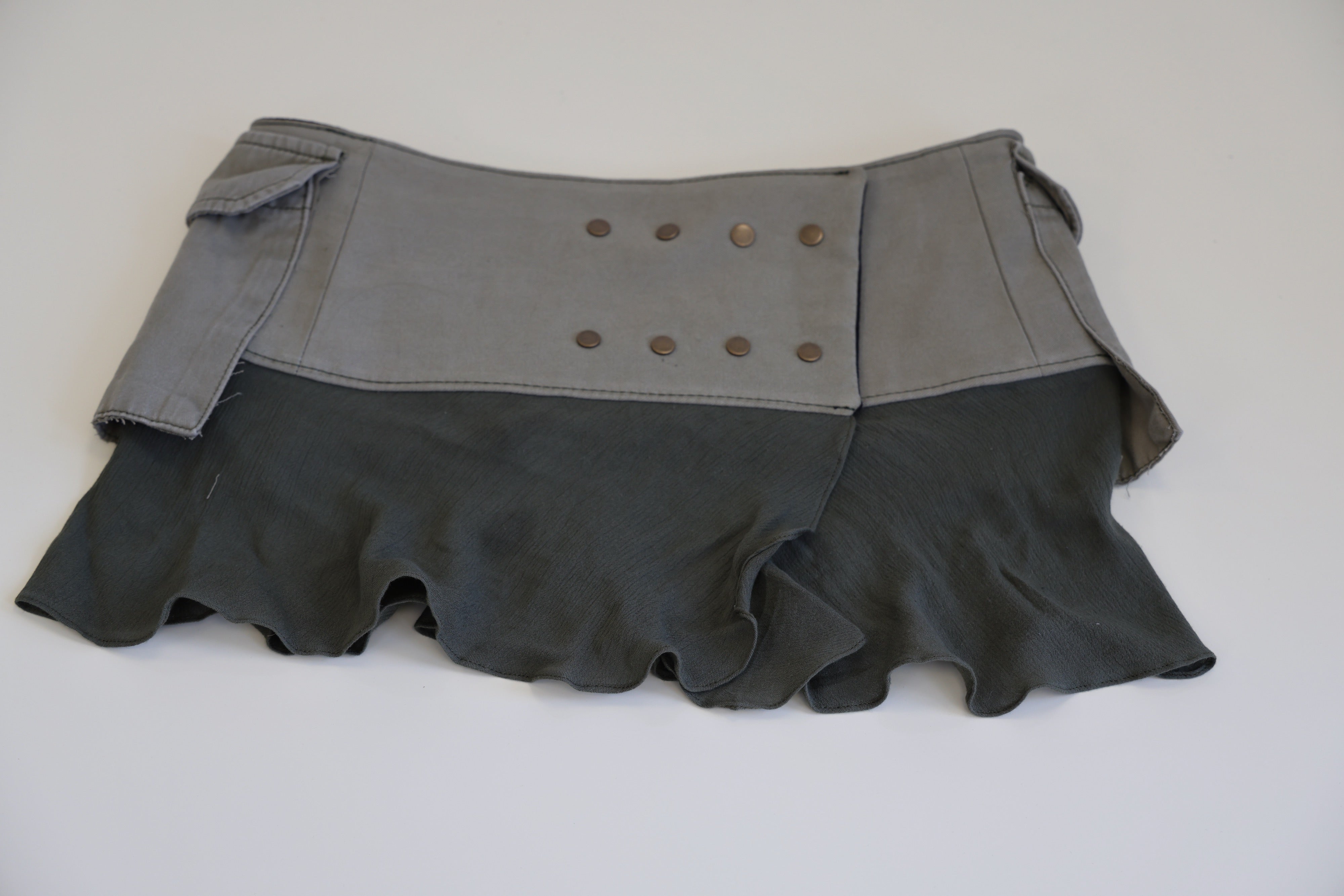 Khaki green with olive trim, bronze button skirt